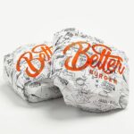 custom burger wrappers with printed logo stacked for packaging